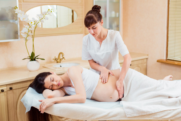 grossesse massage femme enceinte